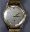 A gentleman's 9ct gold Longines manual wind wrist watch, on associated flexible strap.                                                 