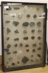 A glazed case of mineral samples                                                                                                       