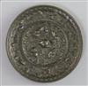 A Chinese bronze 'squirrels and grapes' mirror, Song dynasty or earlier, D. 10cm                                                       