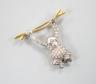 A Victorian style novelty white and yellow metal, diamond chip set brooch, modelled as a monkey hanging from a branch                                                                                                       