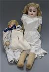 An open mouthed bisque-headed French kid bodied doll and another smaller Austrian doll                                                 