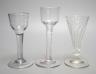 A George III opaque twist stem cordial glass, a George II cordial glass with folded foot and a wrythen twist ale glass (3) - tallest 15cm                                                                                   