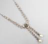 An antique white metal, two colour paste and simulated pearl set drop pendant necklace, 47cm.                                                                                                                               