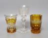Two Bohemian wheel engraved amber flashed beakers, one with titled topographical views and a wheel engraved glass goblet (3) - tallest 18cm                                                                                 
