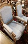 A Victorian oak grandfather chair and matching nursing chair                                                                           