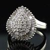 A modern 18ct white gold and diamond pear shaped cluster dress ring, size U.                                                           