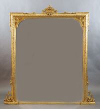 A Victorian gilt gesso overmantel W. 4ft. 6in. H.4ft. 10in.                                                                            