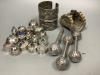 Sixteen Omani decorative silver trinket boxes, inset various semi-precious stones, a wide embossed bangle, a pair of 'cuff' bangles and three other items                                                                   