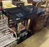 A 20th century modernist chrome and black glass console table, width 119cm, depth 70cm, height 111cm                                                                                                                        