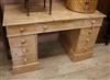 A pine pedestal desk W.120cm                                                                                                           