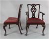 A set of twelve late Victorian Chippendale revival mahogany dining chairs including two carvers,                                       