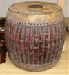 A carved faux bamboo tribal drum                                                                                                       