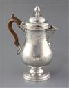 A George III Irish silver pedestal hot water/coffee pot by Matthew West, gross 25 oz.                                                  