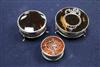 Three circular silver and tortoiseshell trinket boxes, two with pique decoration,                                                      