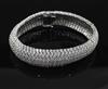 A modern 18ct white gold and diamond encrusted bracelet, 18cm.                                                                         