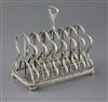 A George III silver seven bar toastrack, by Battie, Howard & Hawksworth?, 11.5 oz.                                                     