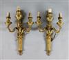 A pair of Adam revival ormolu three branch wall lights, width 12.5in. height 21.5in.                                                   