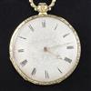 An early 20th century continental engraved gold dress pocket watch and an ornate 9ct albertina chain,                                  