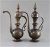 A pair of 19th century Qajar gold inlaid iron rosewater sprinklers, 12.5in.                                                            