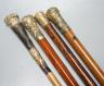 Four Victorian gilt-metal mounted walking canes, longest 97cm                                                                                                                                                               
