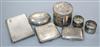 Three silver cigarette cases, a pair of silver napkin rings, a William Comyns embossed silver pot and an oval box                      