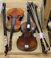 Two Saxon violins and approx. 25 assorted bows                                                                                         