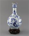 A Chinese blue and white guglet vase, 18th century, H. 23.5cm, wood stand                                                              