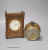 A French walnut cased mantel timepiece, with key, 23cm, and a brass cased Milli-Amps scale                                                                                                                                  