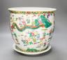 A 20th century Chinese famille rose jardiniere and stand total height 30cm                                                                                                                                                  