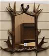 A faux stag antler framed mirror W.54cm                                                                                                