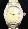 A lady's 1980's 18ct gold and after market diamond set Rolex Oyster Perpetual Datejust,