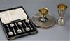 A modern silver champagne cover by Brian Leslie Fuller, a silver single/double measure cup, cased set of silver spoons, etc (4)        