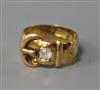 A late Victorian 18ct gold and diamond set buckle ring by Constantine & Floyd, size M.                                                 