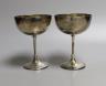 A pair of Edwardian silver wine coupes, Edward Barnard & Sons Ltd. London, 1901, 11.9cm, 7oz.                                                                                                                               
