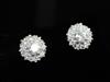 A pair of 18ct white gold and diamond cluster ear studs, 10mm.                                                                         