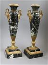 A pair of marble urns and mounts                                                                                                       