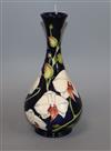 A Moorcroft Chatsworth Orchid bottle vase, seconds height 23cm                                                                         