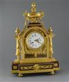 A 19th century French Louis XVI style ormolu and red marble mantel clock, H.23in.                                                      