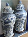 A pair of Chinese 20th century blue and white large floor vases and covers, H approx 118cm                                             