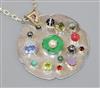 A bespoke white metal and multi gem set shaped circular pendant, on a white metal chain, pendant 52mm.                                 