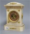 A 19th century alabaster French mantel clock with skeletonised centre height 29cm                                                      