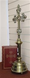 A leather bound altar Missale Romanum and a bronze crucifix height 87cm                                                                