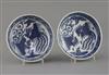 A pair of Chinese Ming blue and white 'phoenix' saucer dishes, pseudo Wanli mark, 17th century, D. 13.5cm                              