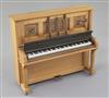 Denis Hillman. A Victorian style walnut miniature upright piano, width 5in.                                                            