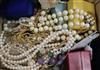 A quantity of silver and costume jewellery, including a faience 'scarab' and turquoise-set pendant,                                    