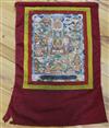 A Tibetan painted silk thangka                                                                                                         