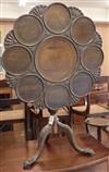 A 1920's Chippendale revival mahogany tilt top tea table with scallop top and a pair of mahogany torcheres table diameter 81cm         