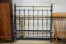 A Victorian style iron and brass double bed frame, width 136cm                                                                                                                                                              