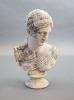 A large weathered white marble bust of a Grecian maiden, 19th century 52cm high (68cm combined, maximum)                                                                                                                    