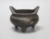 A Chinese bronze tripod censer, Xuande four character mark height 10cm                                                                                                                                                      